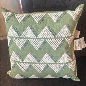 Set of four Alan + Roth indoor outdoor pillows